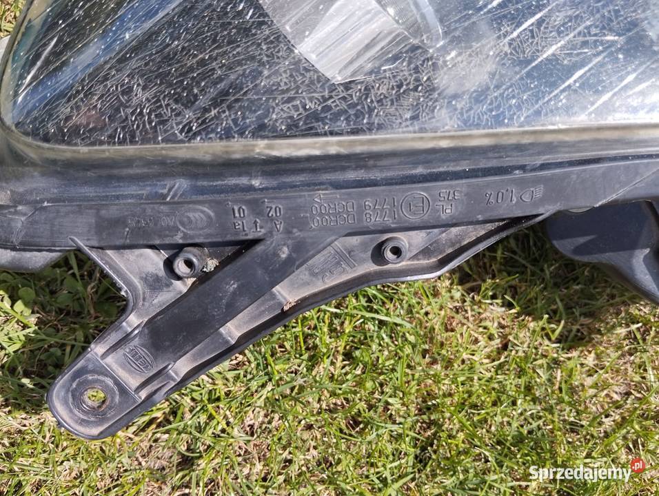 Lampa Opel Astra H III lewy przód BiXenon Kamieniec sprzedam