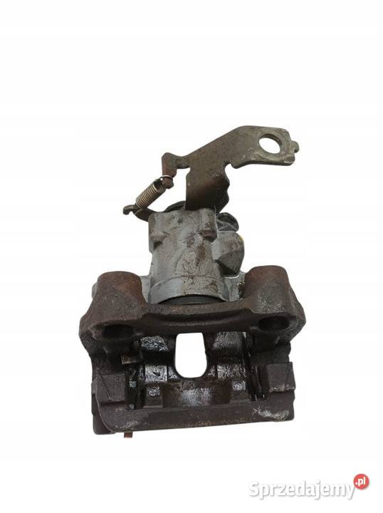ZACISK HAMULCOWY LEWY TYŁ 18 PLUGIN XW50 Toyota