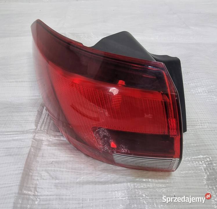 OPEL ASTRA V K LAMPA TYLNA TYŁ LEWA W BŁOTNIK