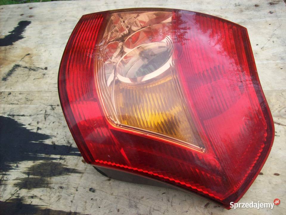 Corolla E12 HTB Lampa lewy tyl tylna lewa Mińsk Mazowiecki