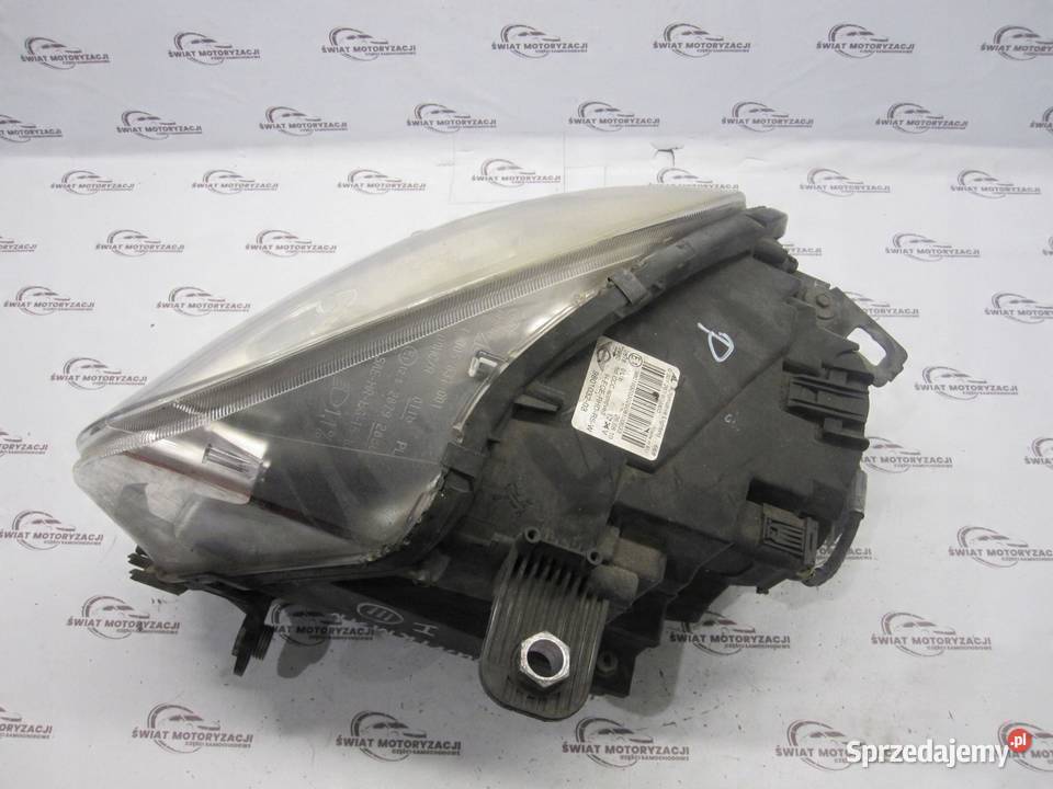 MINI COUNTRYMAN I 11r lampa prawa przód 9801032 osobowe Lampy przednie sprzedam