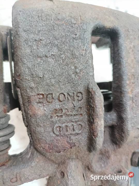 ZACISK HAMULCOWY LEWY TYŁ 32 FSI ELEKTRYCZNY Układ hamulcowy sprzedam