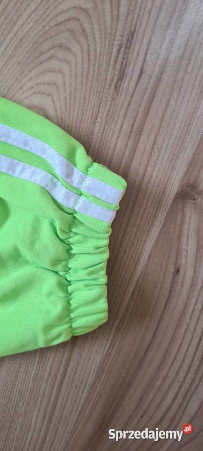 Spodnie dresowe damskie neonowy zielony