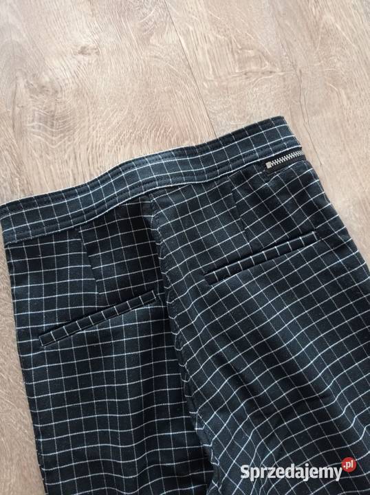 Spodnie w kratkę marki HM Spodnie Hajnówka
