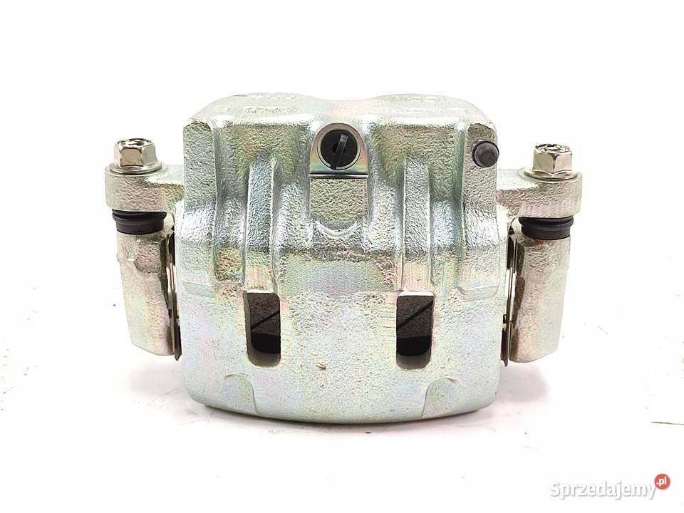 ZACISK HAMULCOWY LEWY PRZÓD KIA CARNIVAL UP GQ