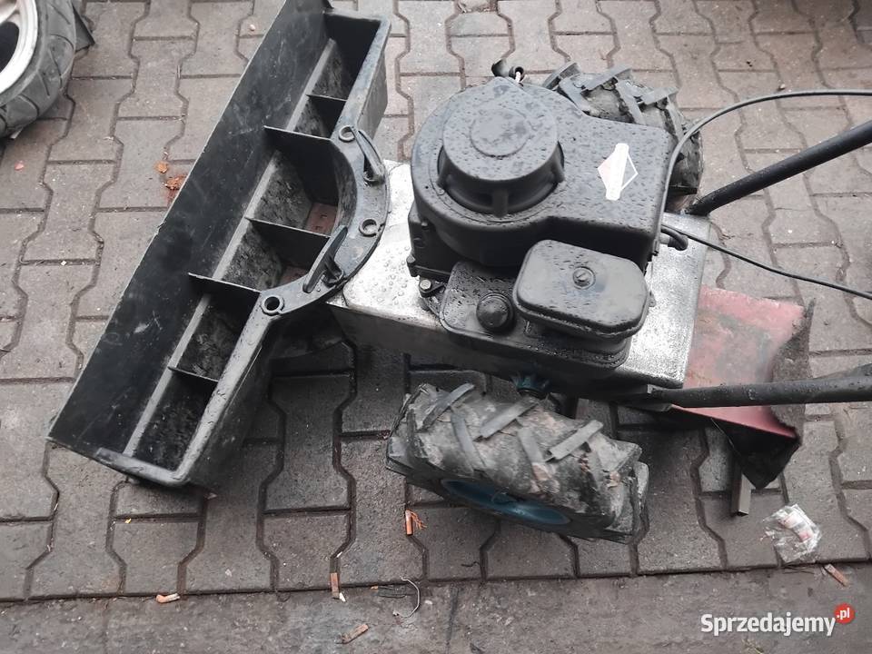 Traktorek jednoosiowy znapedem pług do śniegu Konina