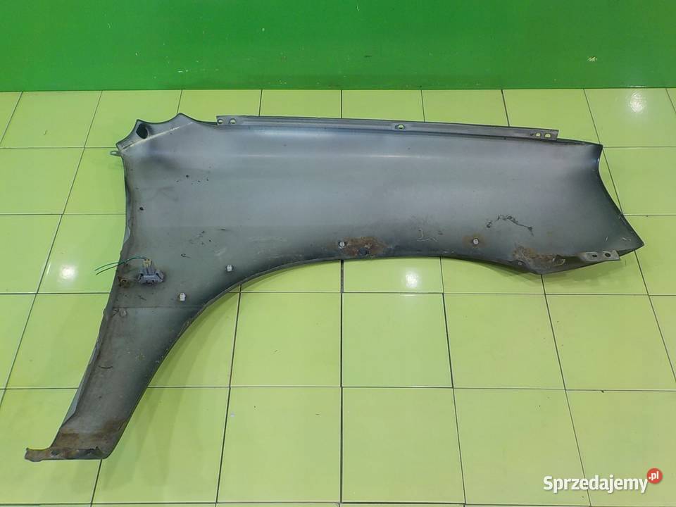 SUZUKI GRAND VITARA I 05r 5D blotnik lewy przod osobowe mazowieckie Suków