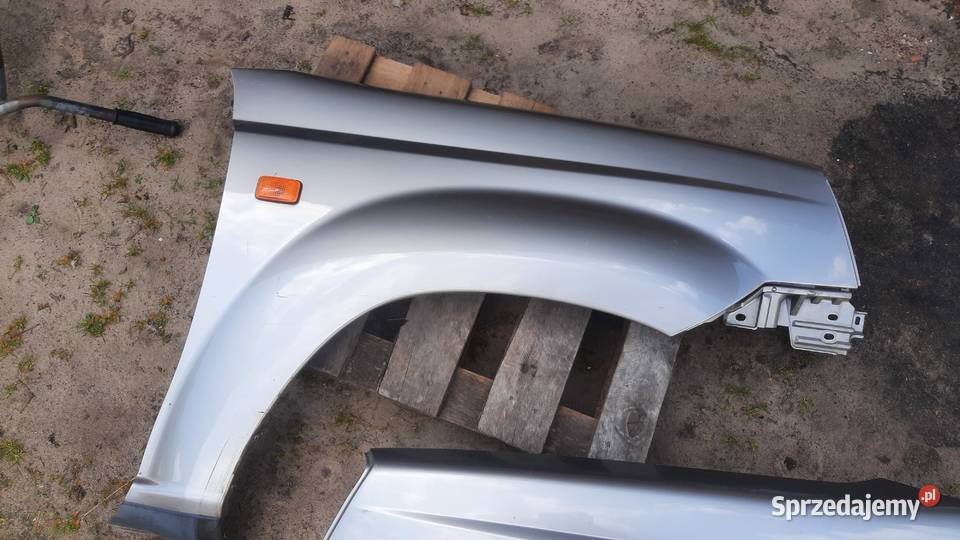Lak KX4K błotnik przedni prawy lewy nissan Błotniki Dębno