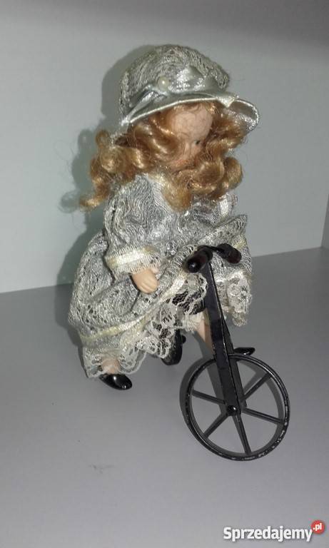 Zestaw porcelanowych lalek rower wózek huśtawka podkarpackie Ropczyce