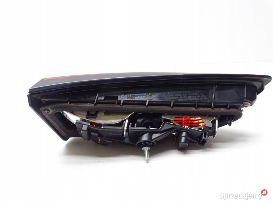 LAMPA PRAWA PRAWY TYŁ TYLNA W KLAPE OPEL ASTRA V Lampy przednie