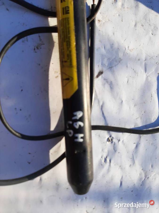 Opel Astra H GTC lewy napinacz pasa 2 wtyczki Ksawerów