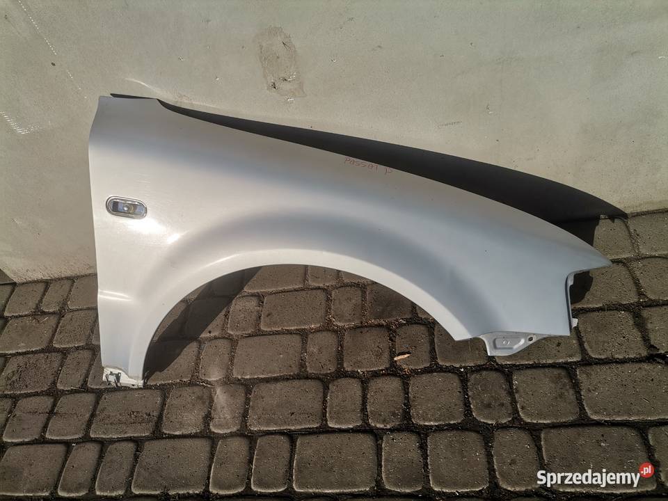 BŁOTNIK PRAWY PRZÓD VW PASSAT B5 LB7Z Nowy Sącz