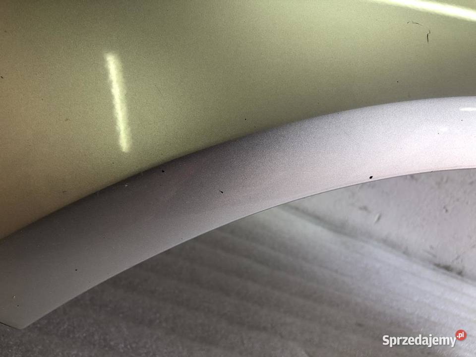 BŁOTNIK LEWY PRZÓD VOLKSWAGEN TOUAREG I LIFT