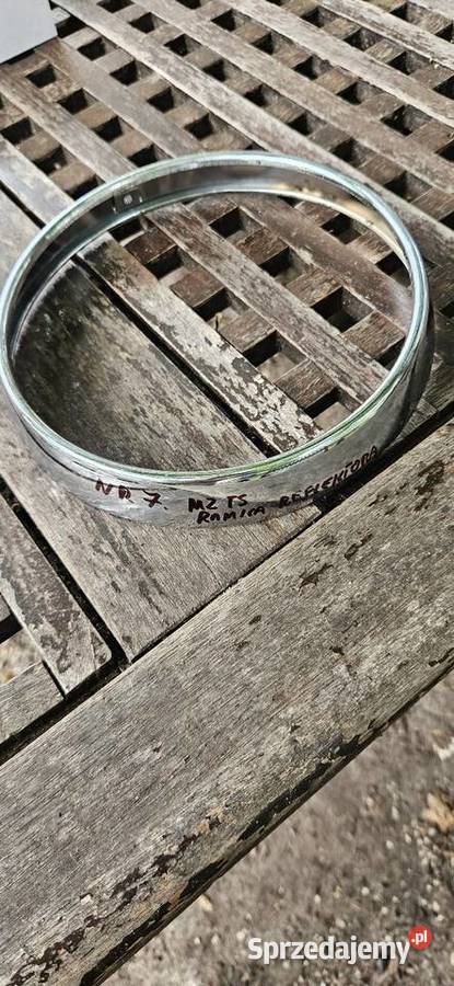 Tel6 0 1 2 4 9 1 0 0OryginałRamka reflektora MZ Pozostałe sprzedam