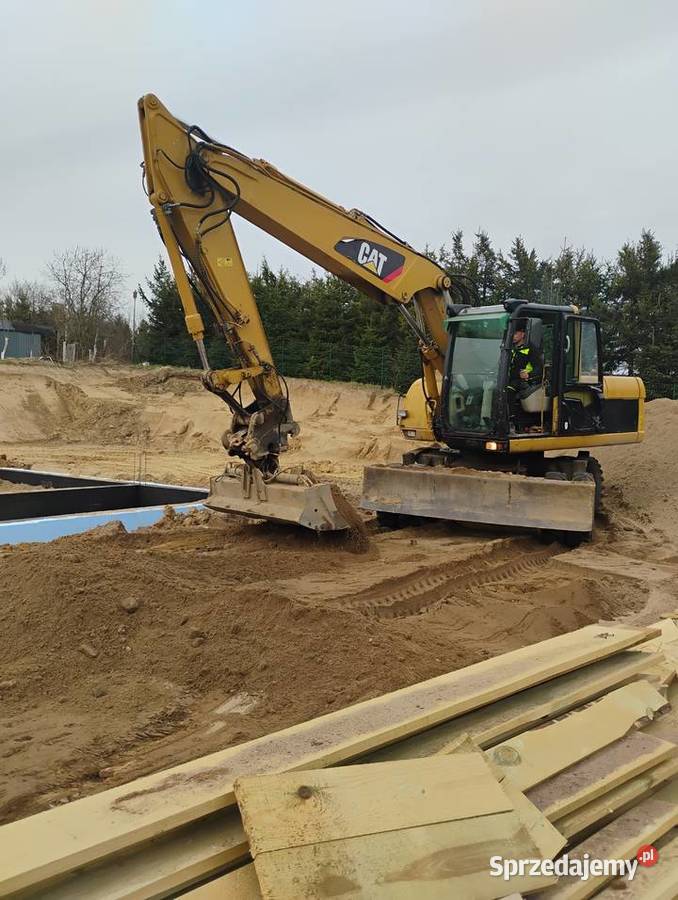 SPRZEDAM KOPARKE KOŁOWA CAT M 316C