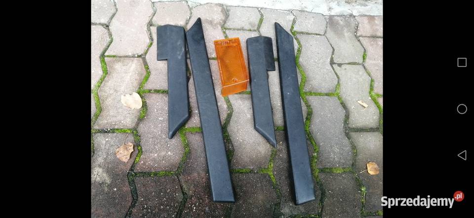 Listwy drzwi i klosz kierunkowskazu Polonez Tychy