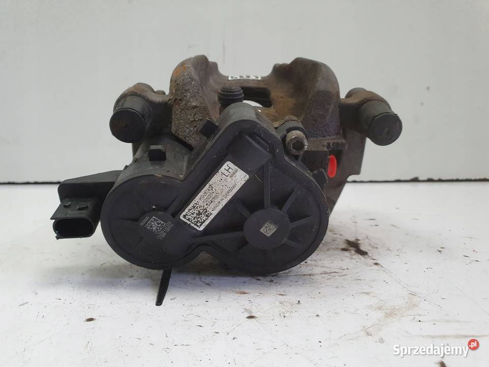 Volvo XC60 II TYLNY ZACISK HAMULCOWY LEWY tył Chełm