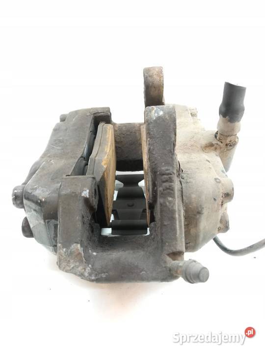 ZACISK HAMULCOWY LEWY PRZÓD 50 V8 20704703 Układ hamulcowy