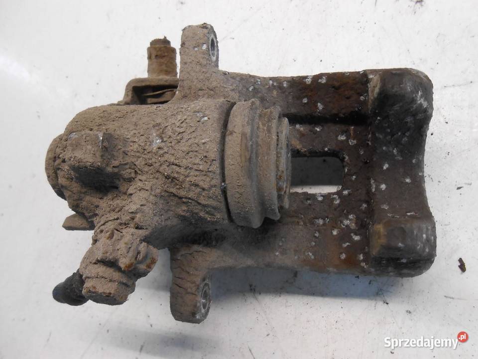 ZACISK HAMULCOWY PRAWY TYŁ AUDI A4 B6 18 T