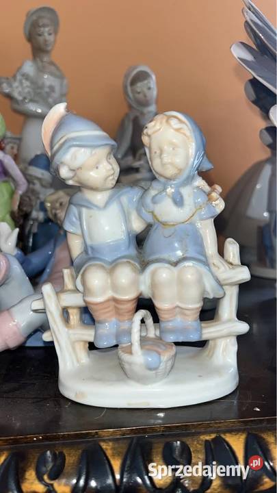 Figurka Para Syg Terra Dzieci na płocie z Porcelana i szkło Gdańsk