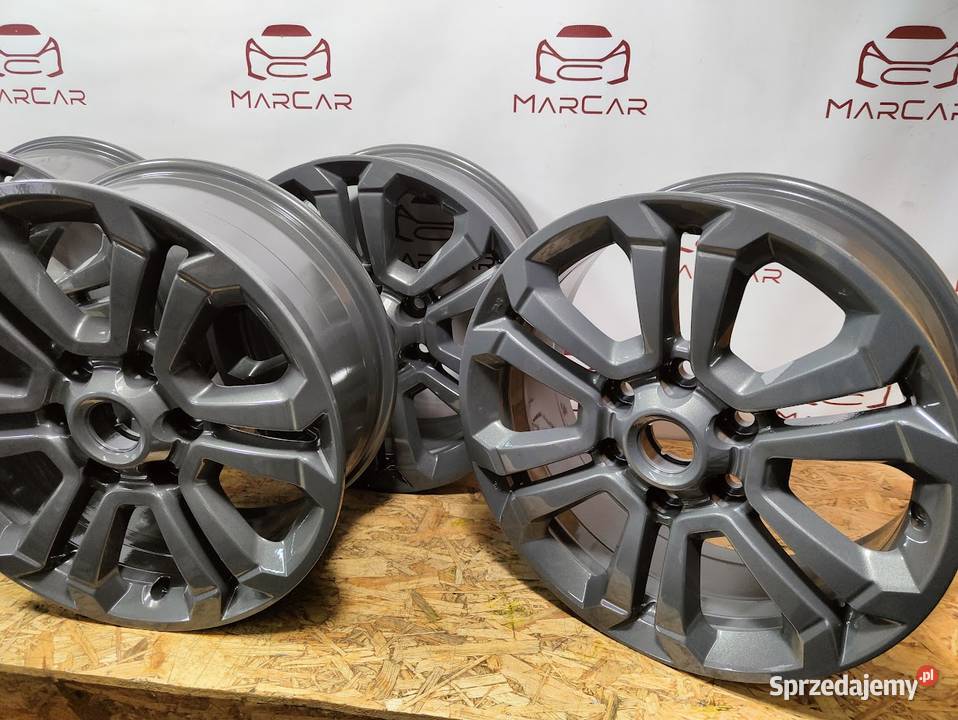 Felgi Aluminiowe Mitsubishi L200 J18x75 ET38 Mitsubishi OE Pleszew sprzedam