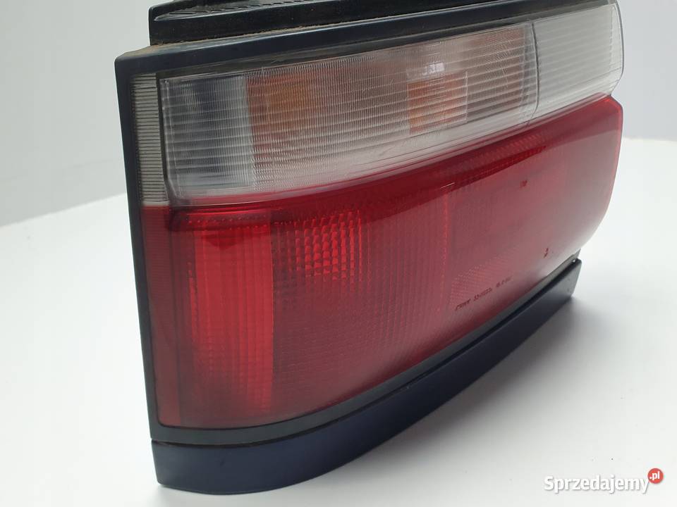 Toyota Corolla E10 E100 VII 9297r TYLNA LAMPA Rudka sprzedam