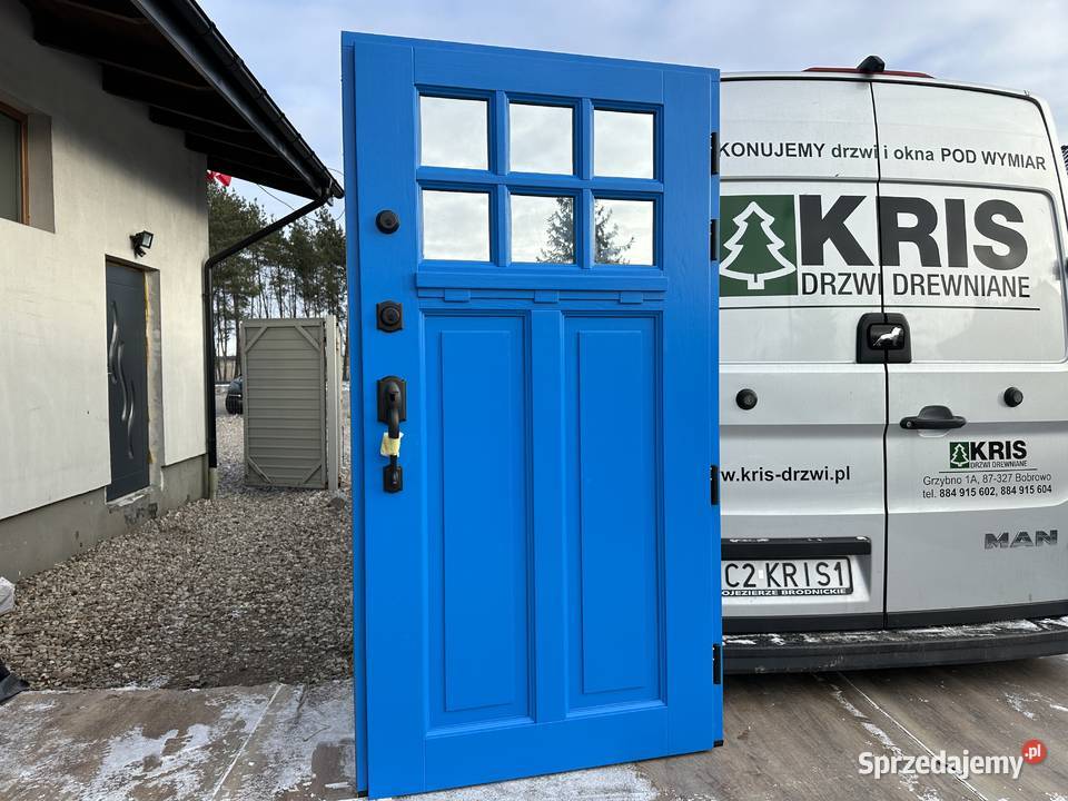 Drzwi zewnętrzne drewniane z klamką schlage NA