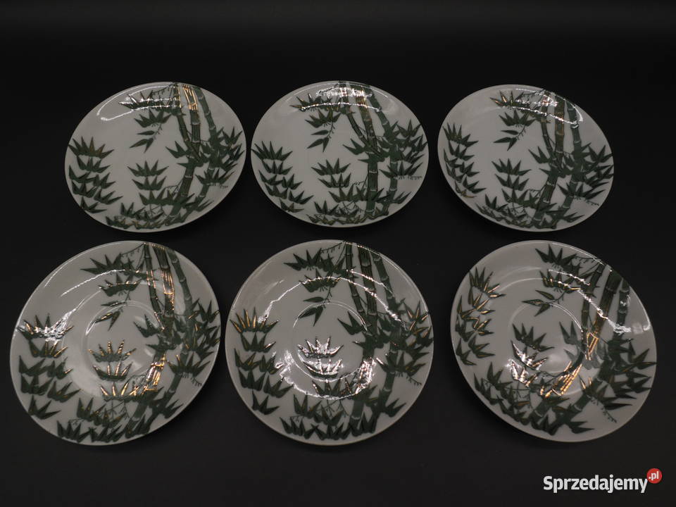 Talerzykipodstawki porcelanowe ozdobione motywem Raszków