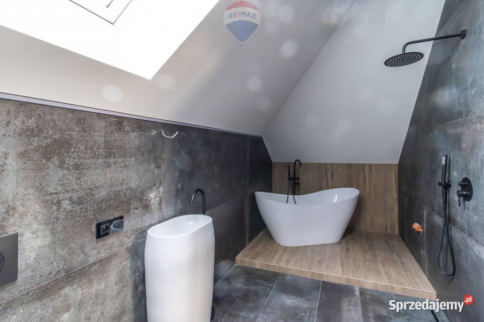 Nowy dom z pompą ciepła i garażem Łodzi pustak Jedlicze A