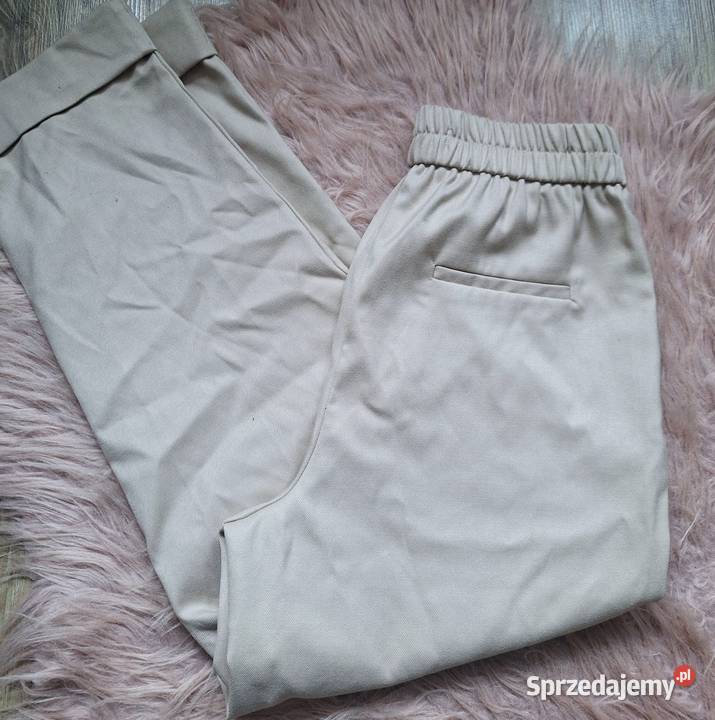 Spodnie materiałowe beżowe Reserved szerokie Kraków