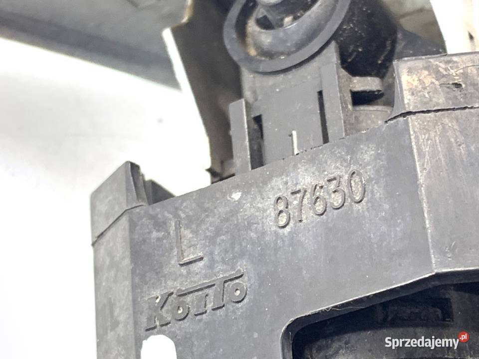 SPRYSKIWACZ REFLEKTORA LEWY PRZÓD MITSUBISHI