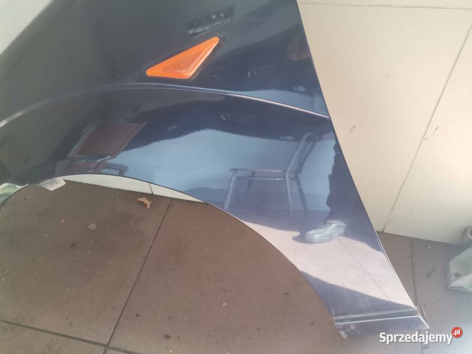 BŁOTNIK LEWY PRZÓD PRZEDNI FORD FOCUS MK1 KOLOR