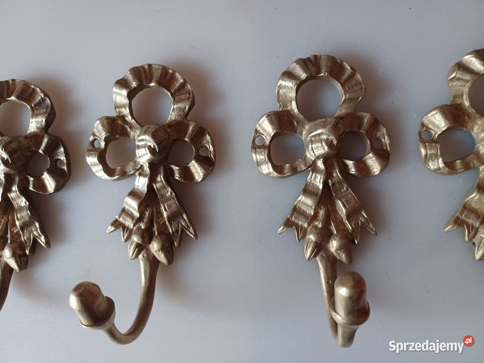 Komplet czterech pięknych mosiężnych wieszaków wielkopolskie Poznań