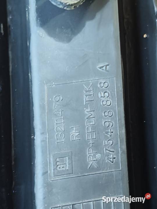 OPEL CORSA D 0611 KRATKA ZDERZAKA PRAWA 13211479 Karoseria Orły
