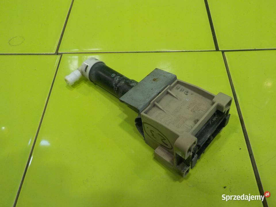 MAZDA CX7 LIFT 22 D 09r spryskiwacz lampy lewy