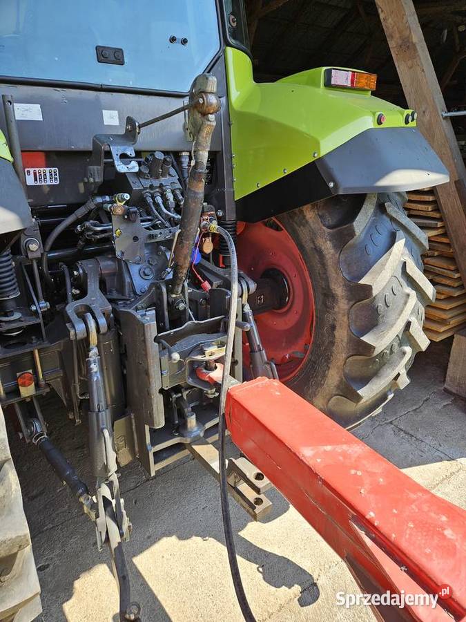 Ciągnik Renault Claas Ares 557 nie john deere Claas Ładowacze czołowe Ładowacze czołowe Sejny