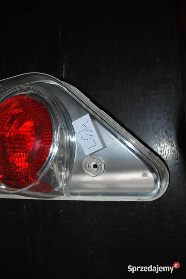 USZKODZONA LAMPA HELLA CARALUNA Grzebowilk