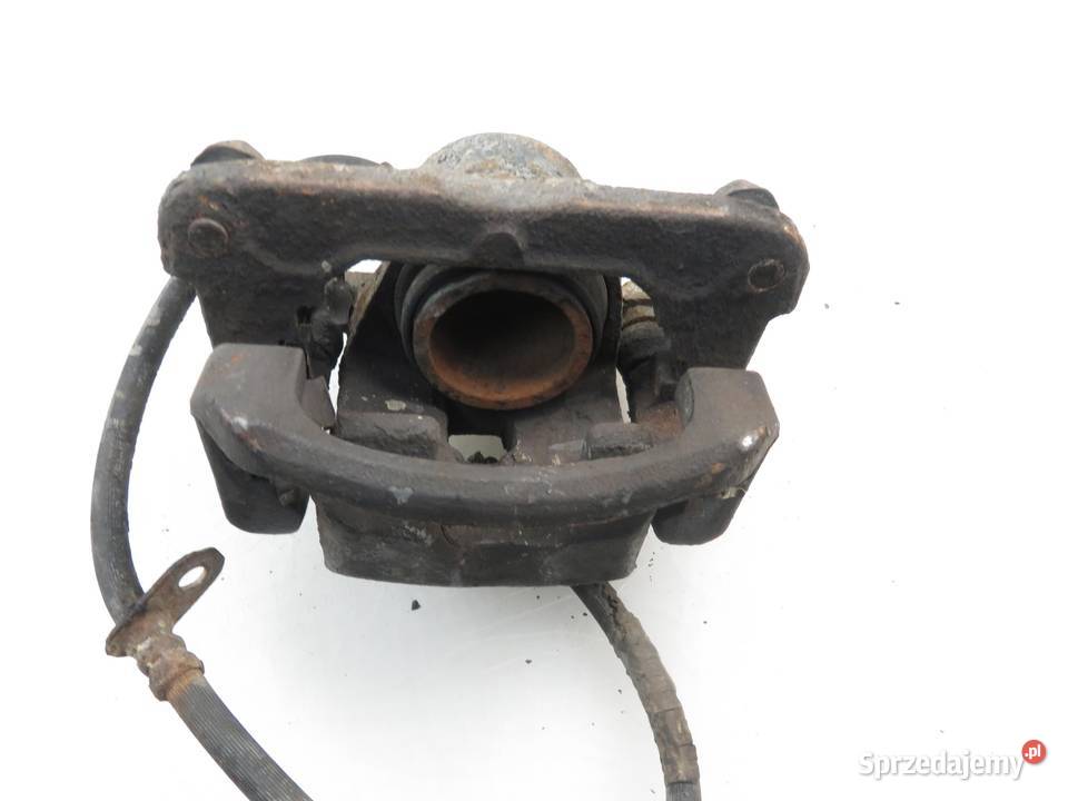 ZACISK LEWY PRZÓD TOYOTA RAV 4 II 20 D4D