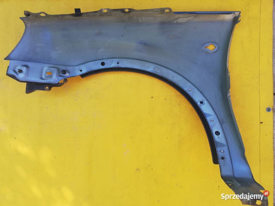 błotnik przód prawy Opel Corsa C r0006 srebrny Piotrków Trybunalski