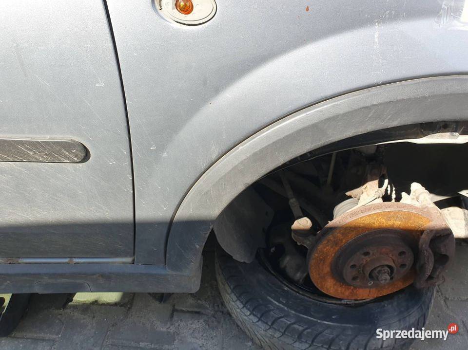 BŁOTNIK PRAWY PRZÓD OPEL CORSA C L163 Lipno