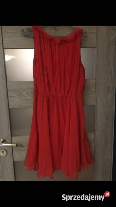 Koralowa plisowana sukienka rozmiar S Spódnice i sukienki Skawina