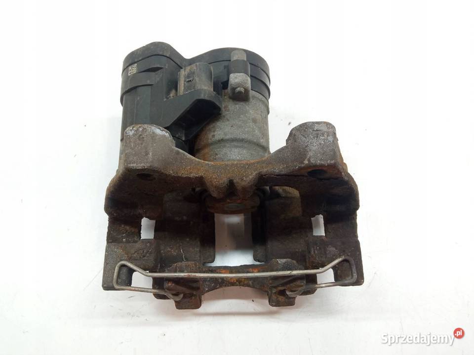 ZACISK HAMULCOWY LEWY TYŁ 5Q0615405EE Skoda