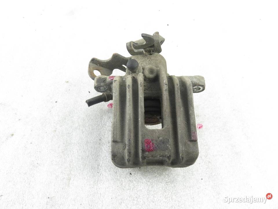 ZACISK LEWY TYŁ AUDI A4 B5 19 TDI