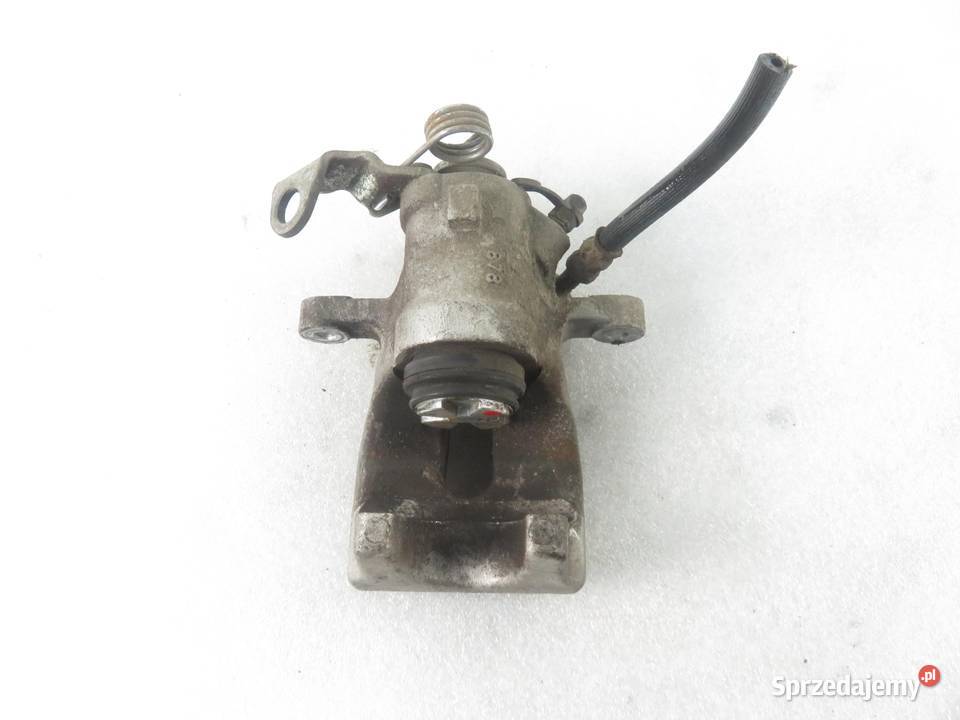 ZACISK LEWY TYŁ OPEL MERIVA A 16 16V 105 Z 16