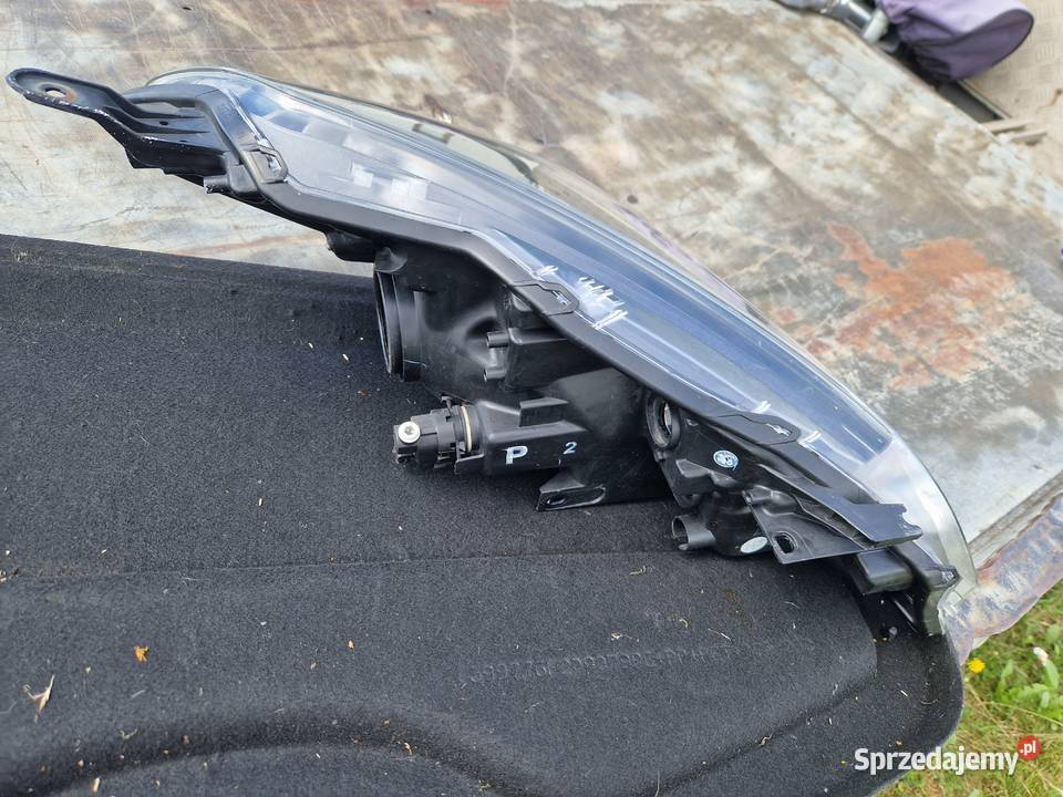 Toyota Yaris III Lift reflektor ORG EU Mielec