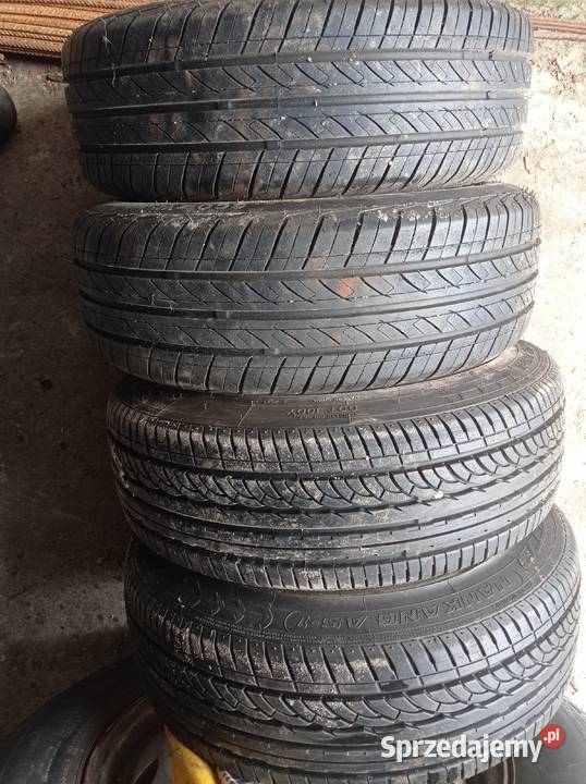 Alufelgi 14 4x1143 opony 1655514 z rantem Średnica 14" Górno