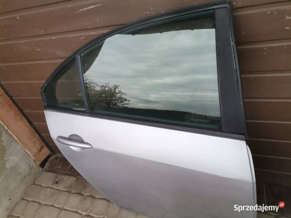 NISSAN PRIMERA P12 HB DRZWI PRAWY TYŁ KY0G Nowy Sącz