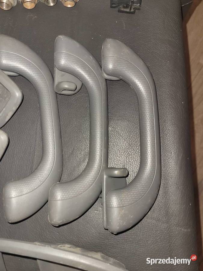 kia carens II 4 Sruby do kół 3 uchwyty4 obudowy osobowe