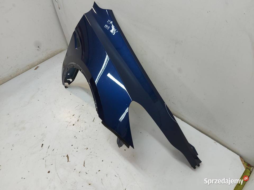 TESLA MODEL Y 2024r BŁOTNIK PRAWY PRZÓD