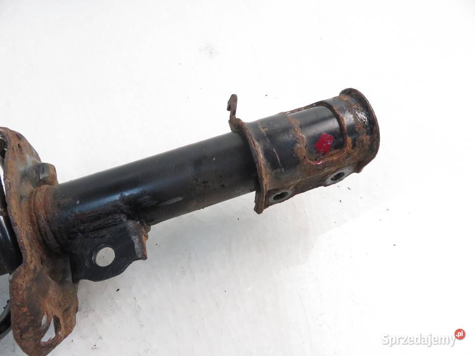 MCPERSON LEWY PRZEDNI OPEL TIGRA 14 B